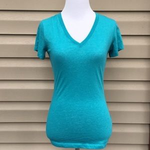 Nike women’s aqua blue short sleeve shirt